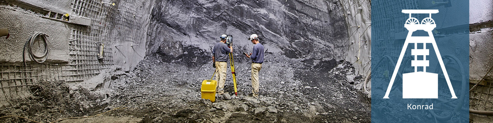 Two employees with measuring equipment at a drilling site