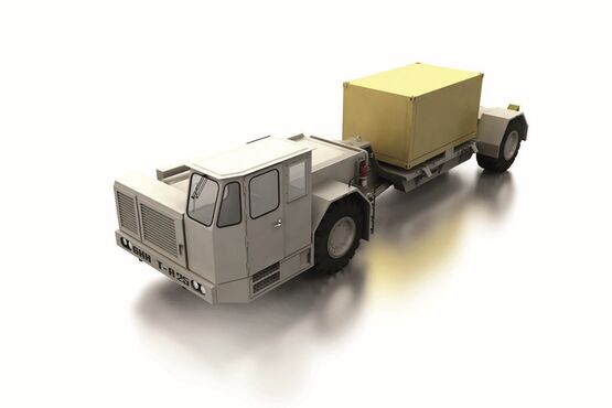 Transportfahrzeug mit einem Container auf der Ladefläche.