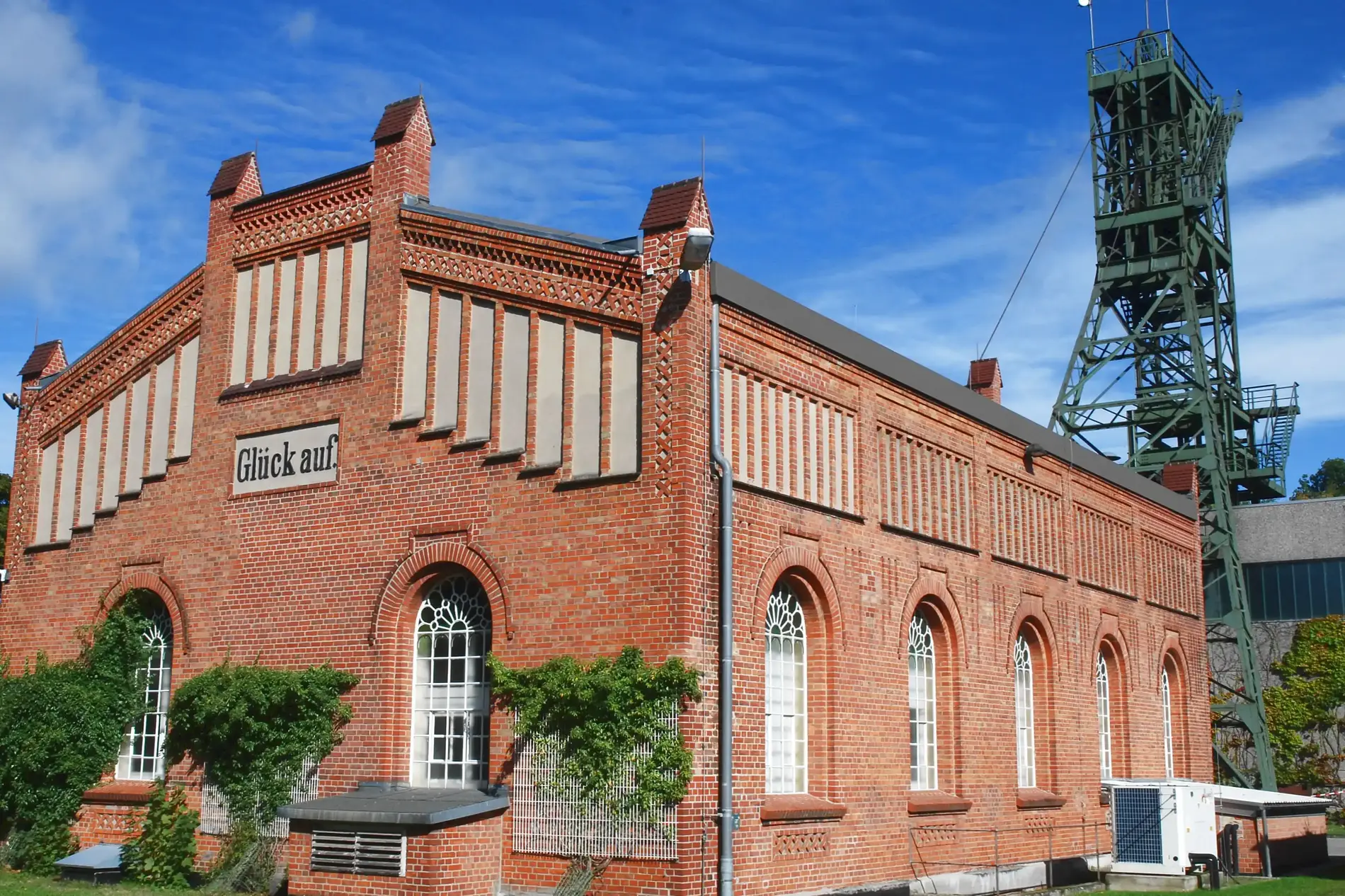 Machine hall of the Asse II mine, winding tower in the background