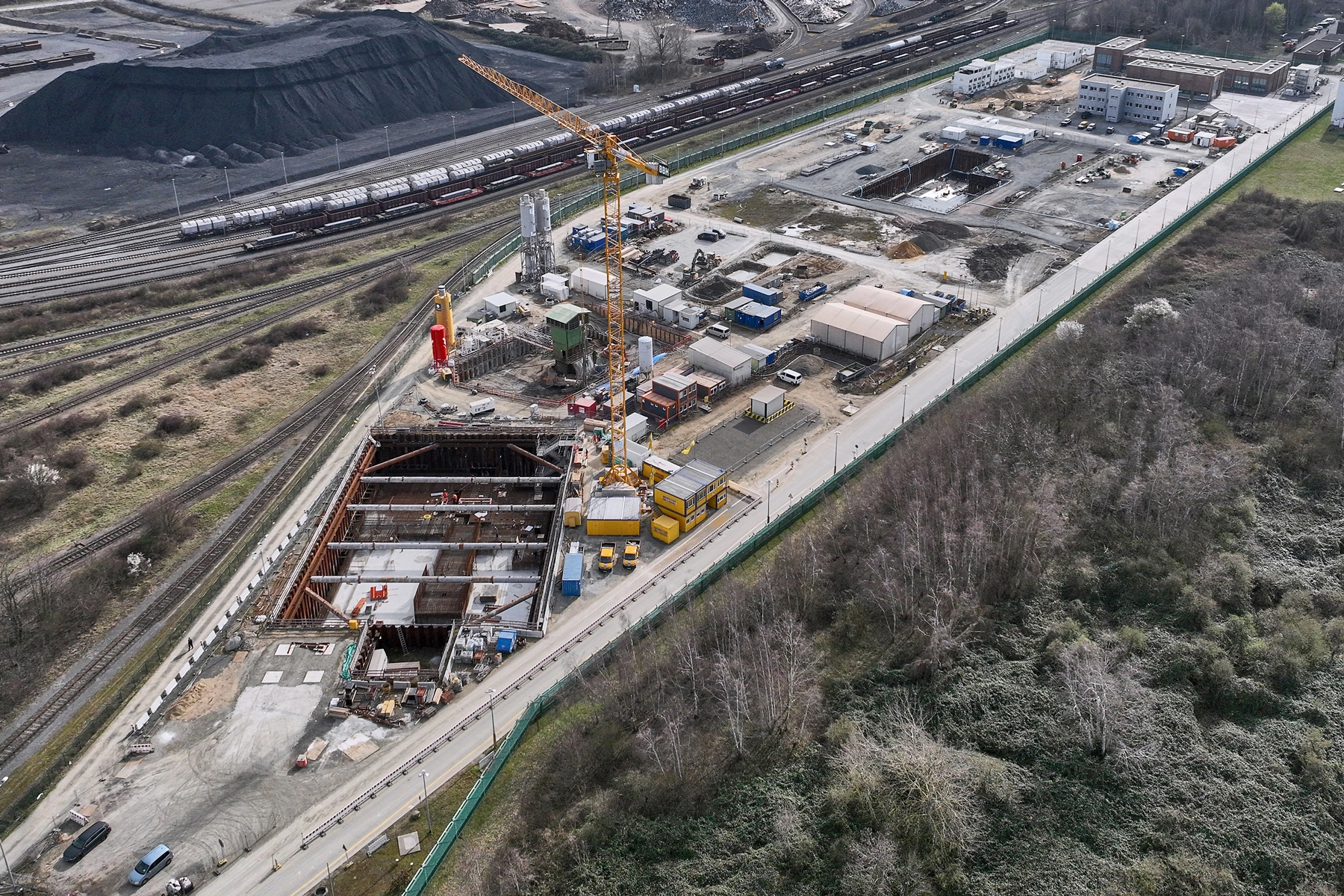 The Konrad 2 mine from the air. You can see excavation pits, construction containers and a crane. 
