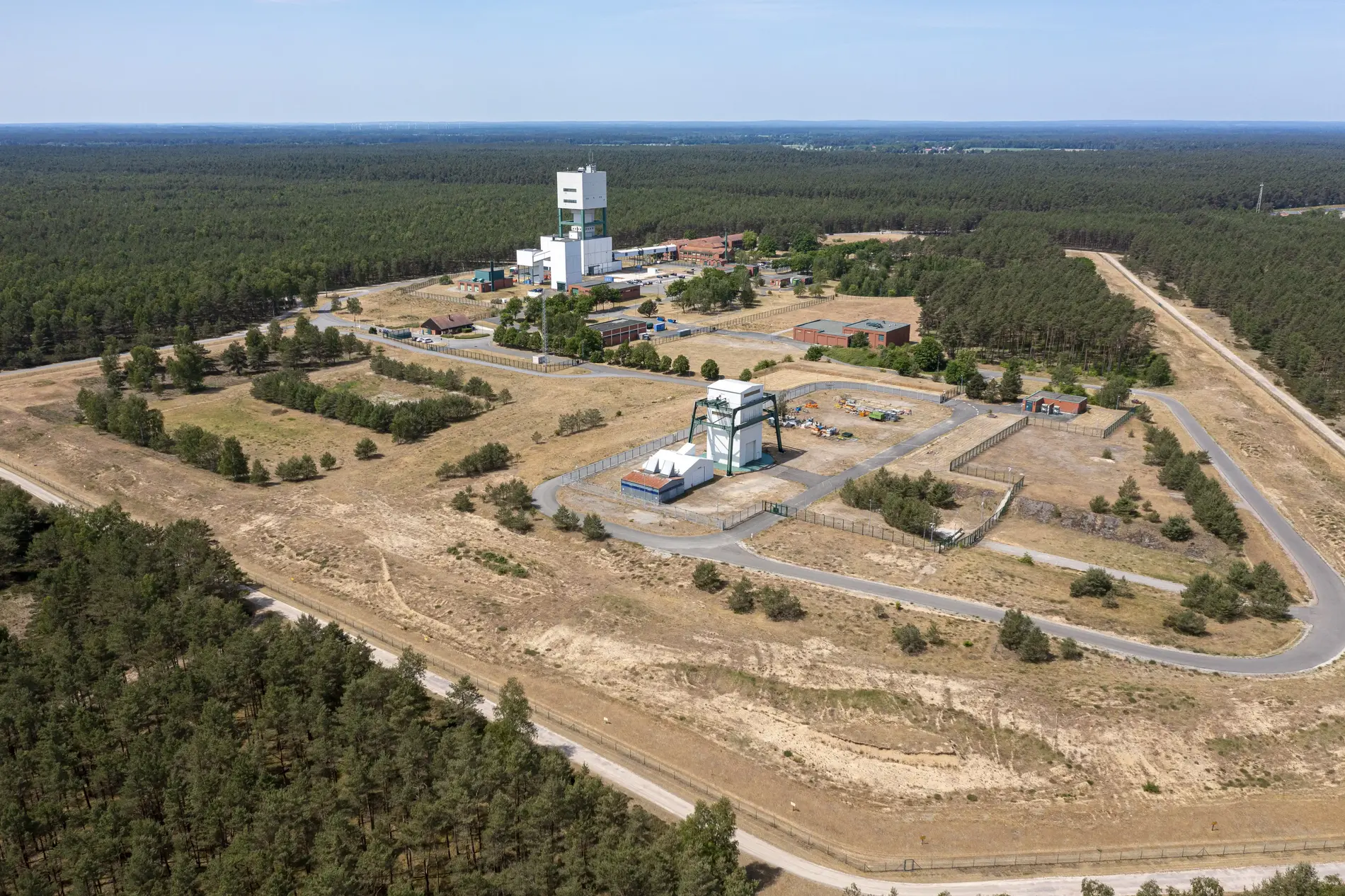 The Gorleben mine site photographed from the air. It is surrounded by huge areas of forest. 