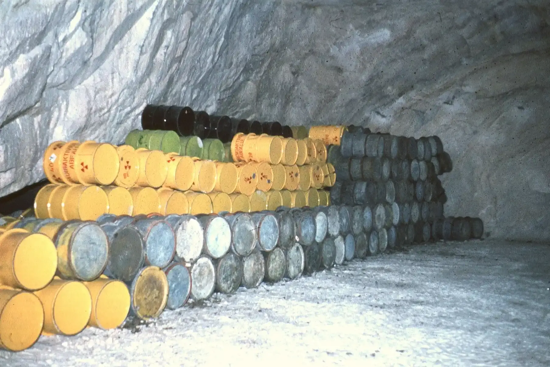 Drums stacked horizontally in the Asse