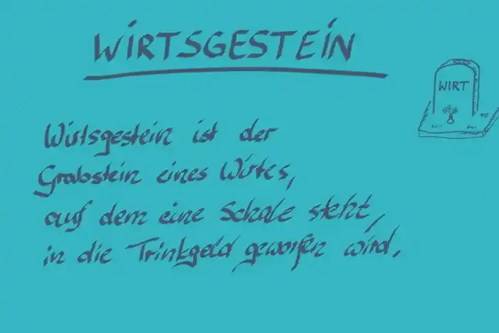 Handschriftliche Notiz, auf der steht: "Wirtsgestein - Wirtsgestein ist der Grabstein eines Wirtes, auf dem eine Schale steht, in die Trinkgeld geworfen wird."