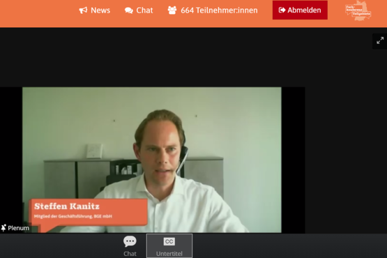 Das Foto zeigt den BGE-Geschäftsführer Steffen Kanitz in einem Screenshot bei der digitalen Fachkonferenz Teilgebiete. Um das Foto herum ist das Konferenztool der Fachkonferenz zu erkennen. 
