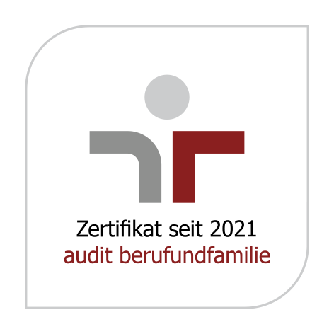 Grafisches rot-graues Symbol auf weißem Grund mit der Aufschrift "Zertifikat seit 2021 audit berufundfamilie".