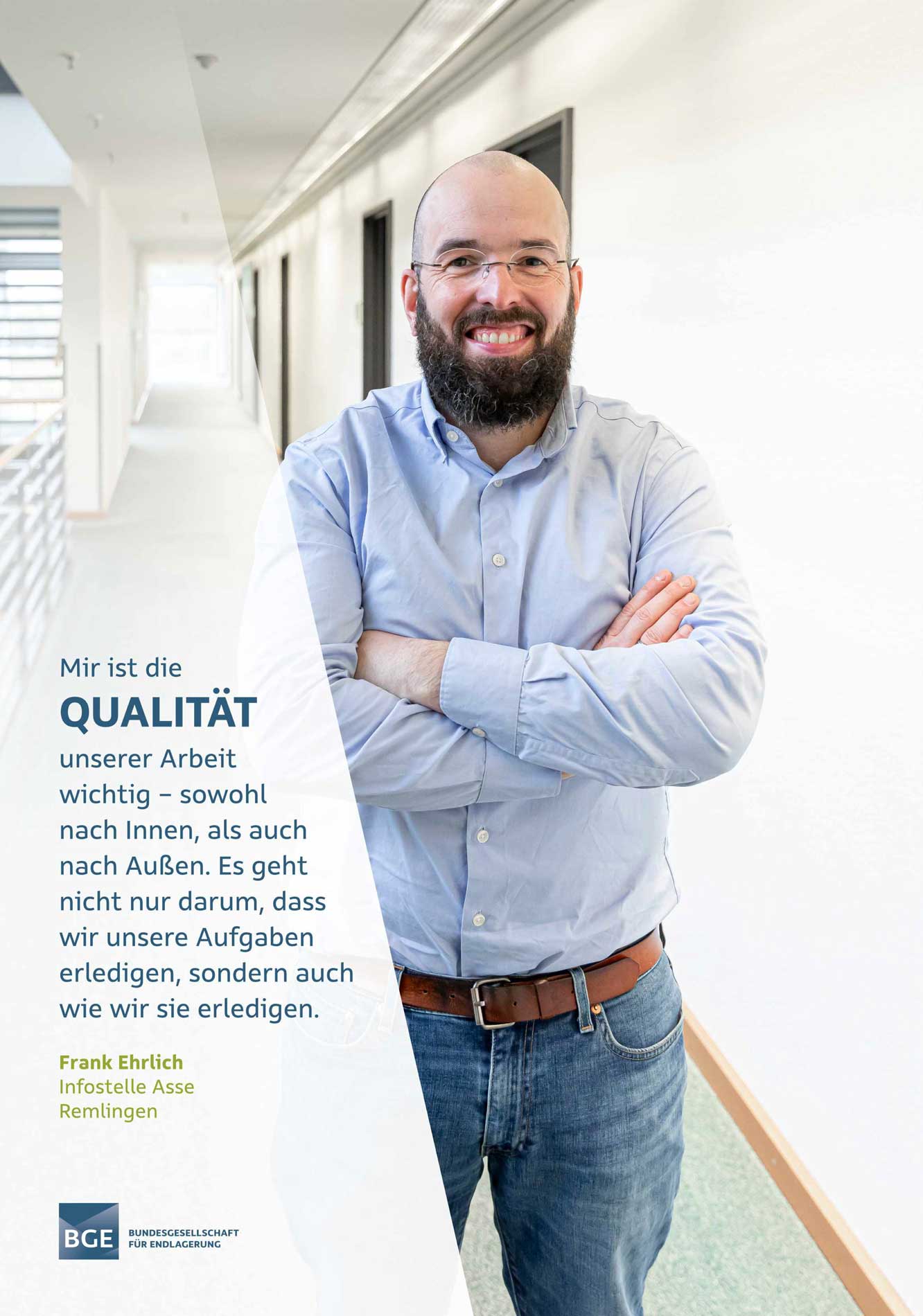 Quality A man ist standing in the aisle of the BGE Building