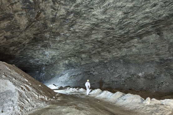 A person is standing in a former mining chamber at the Morsleben repository. The chamber is very large.